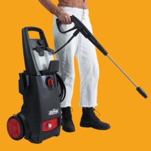 South Asian female holding a pressure washer on a yellow background